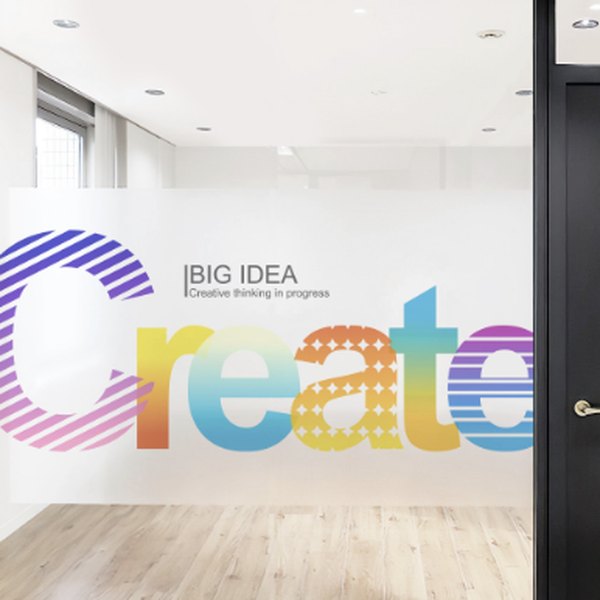 Frosted office glass with colorful printed lettering