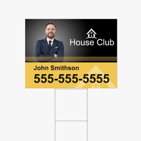 Real estate yard sign on an H-stake