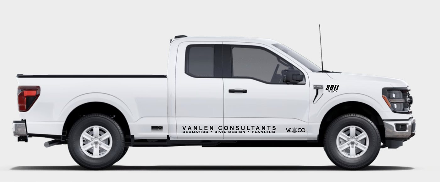White pickup truck with Vanlen Consultants door lettering